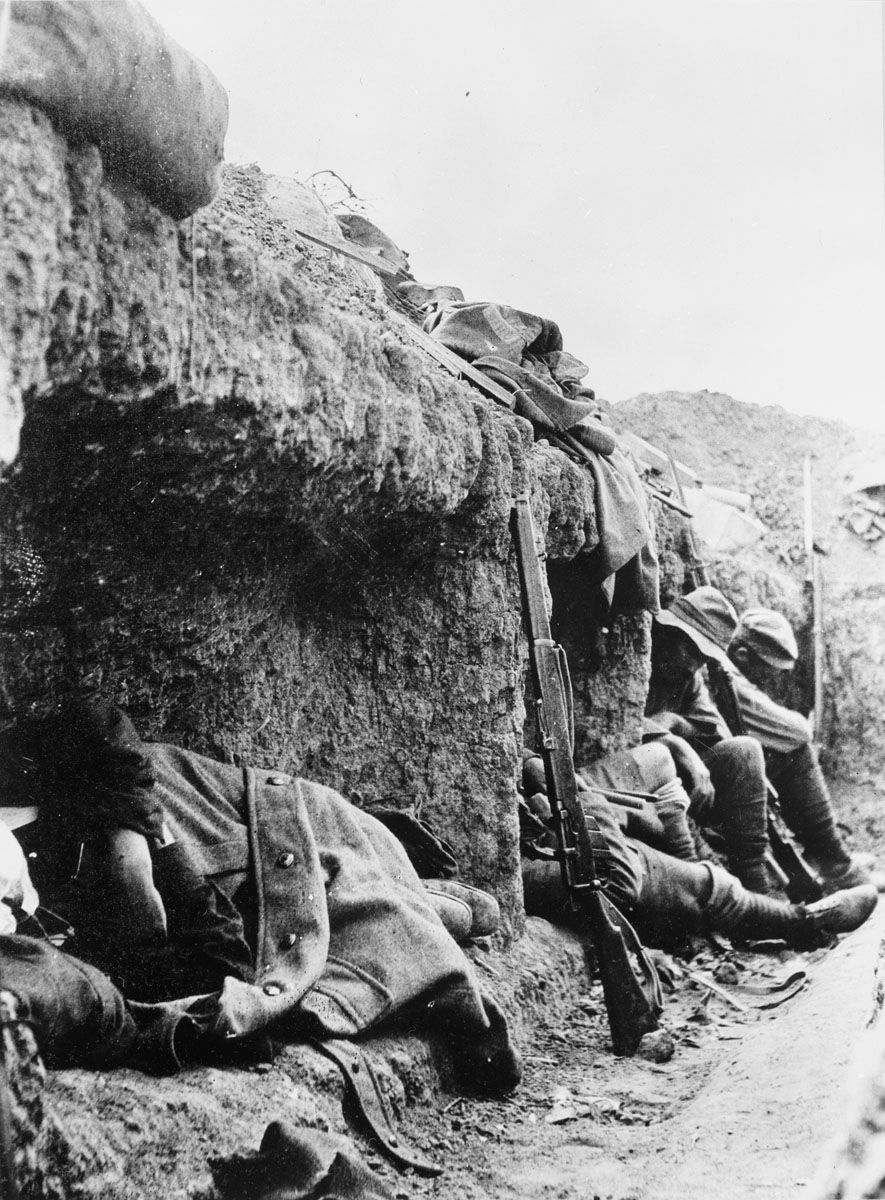 New Zealand soldiers resting in the trenches on Rhodedendron Spur, a few weeks after it was taken.